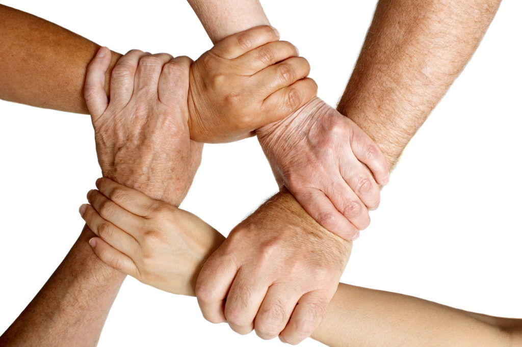 Different ages holding arms Mulling Corporation